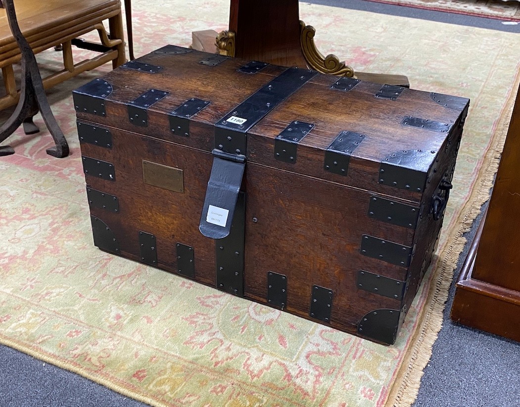 A Victorian iron bound oak silver chest, bears engraved brass plaque, “Major Richards 55 Regt”, width 71cm, depth 35cm, height 38cm